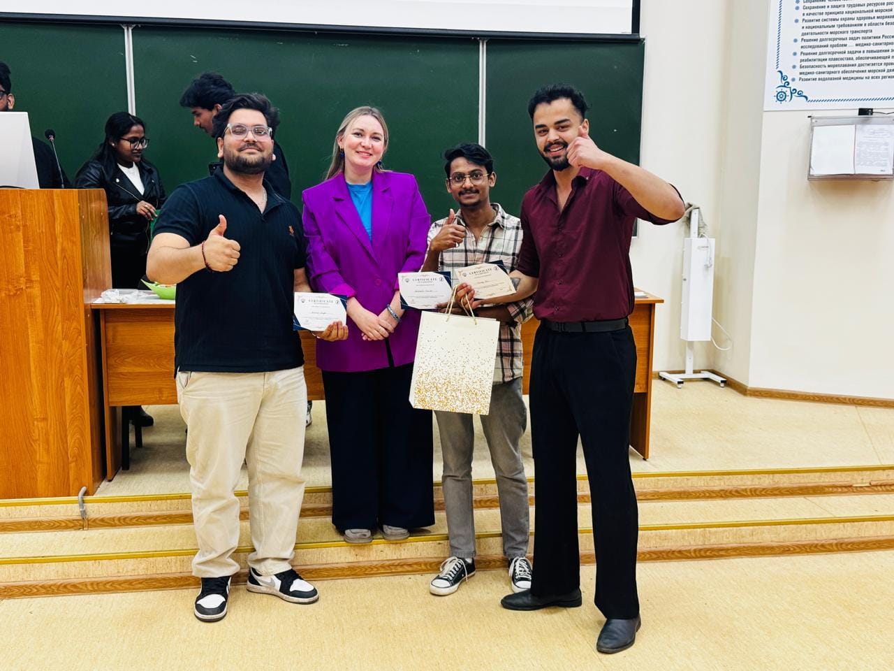 Students receiving certificates at a university event