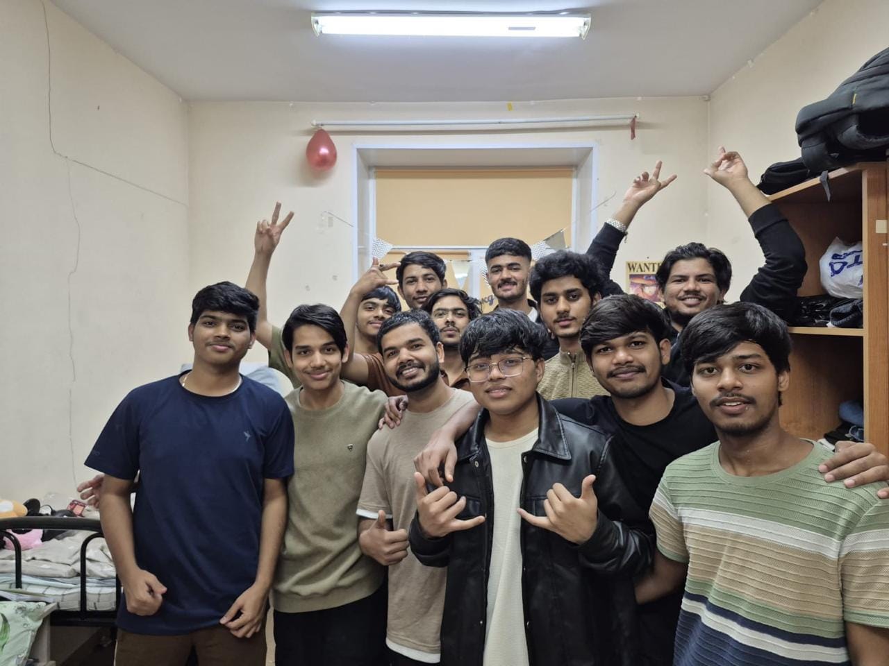 Indian students together in their hostel room