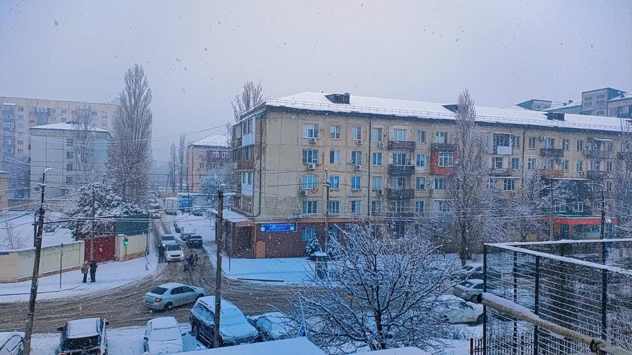 Snowy winter street near the university campus in Russia